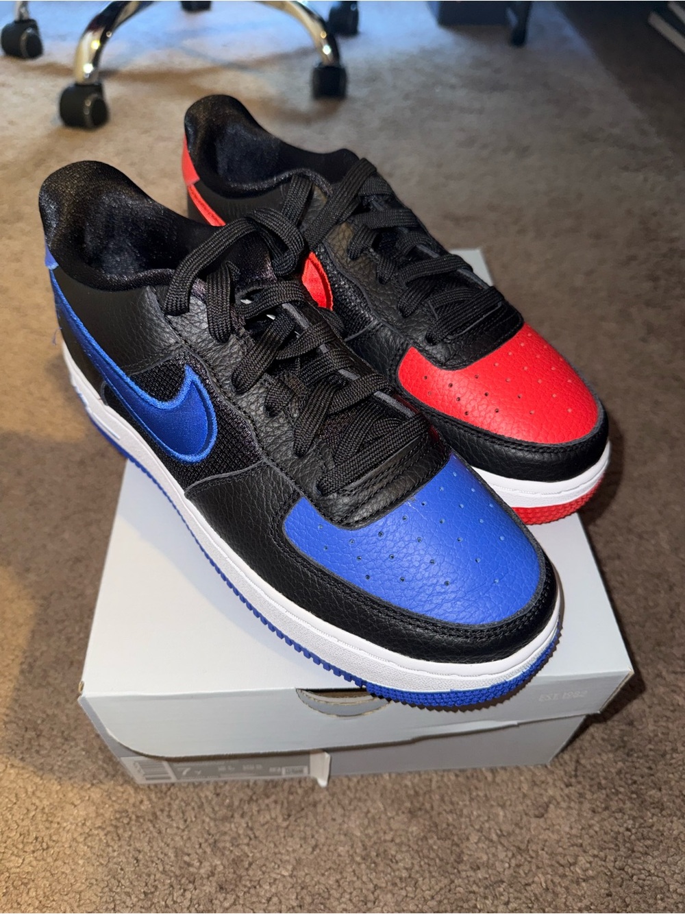 Nike Kids Low-Top Sneakers in Black with Blue & Red Accents